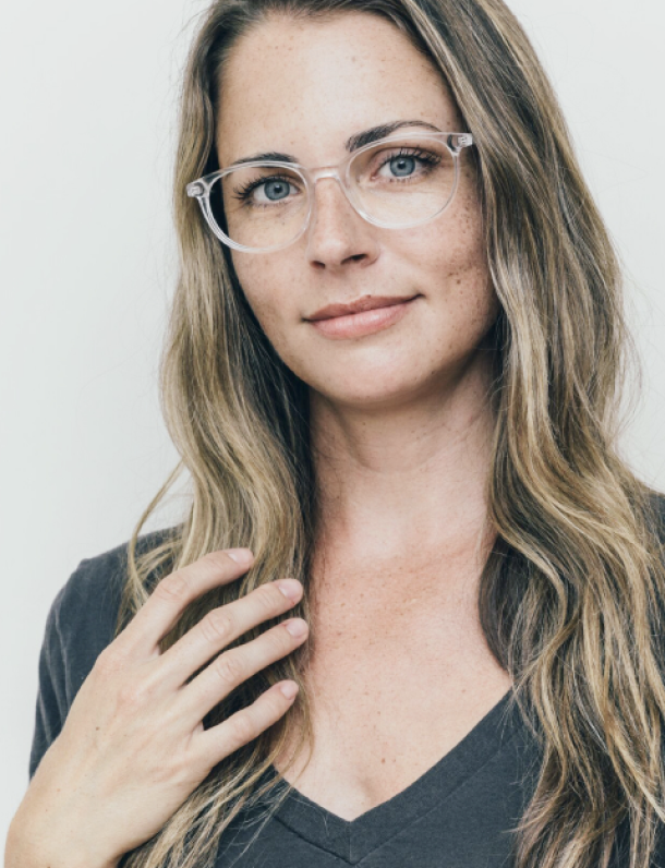 Woman wearing clear frame.