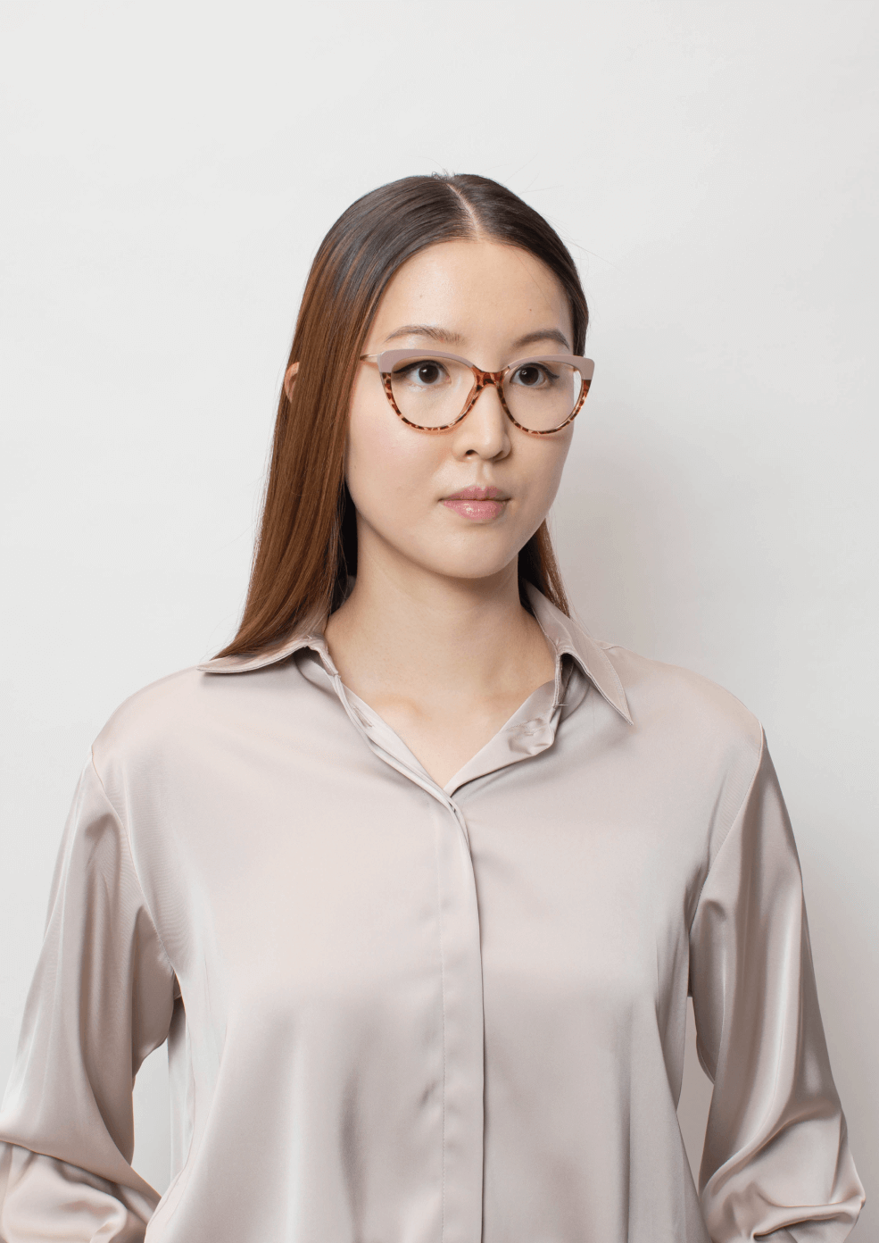 Women wearing cateye frames.